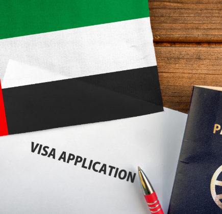 Successful investor and employment visa processing with UAE flag passport and visa application documents representing smooth residency approval for clients in Dubai - EL Business Consultants 2026