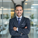 Satisfied business owner discussing successful company setup in Dubai through EuroLink services.